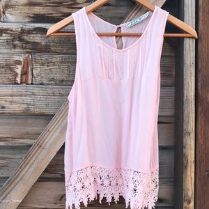 Sleeveless pink blouse